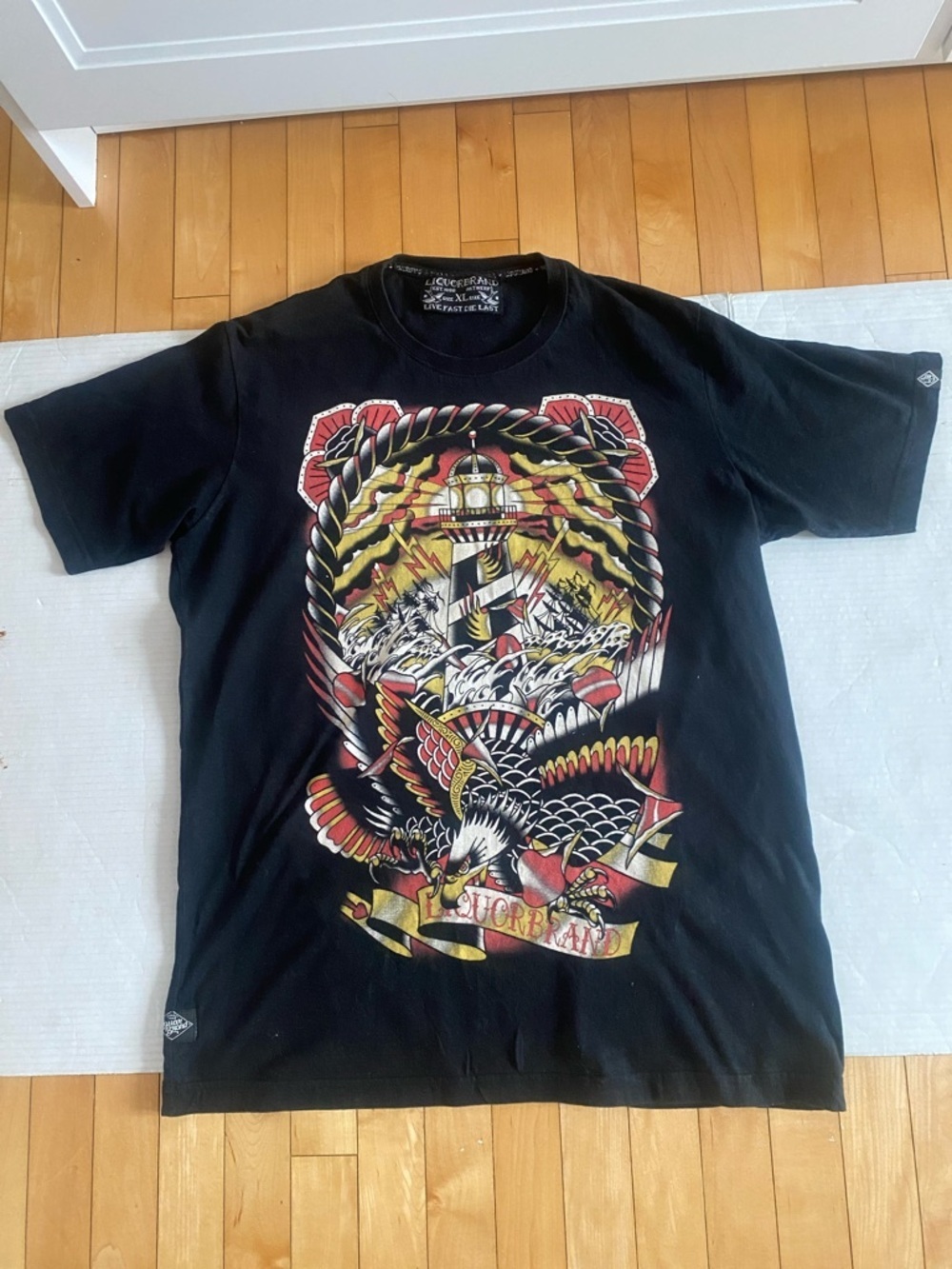LIQUORBRAND black crew neck graphic of lighthouse/Eagle/Ship T-Shirt Sze X-Large